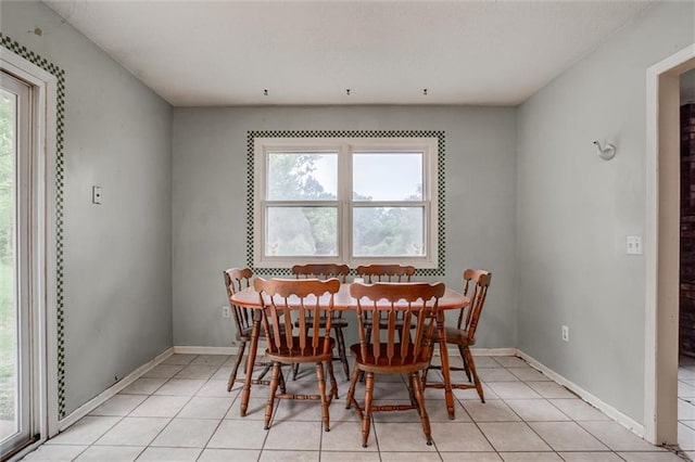 11301 Deer Haven Ln, Excelsior Springs, MO 64024 - dining area featuring plenty of natural light and light tile patterned flooring