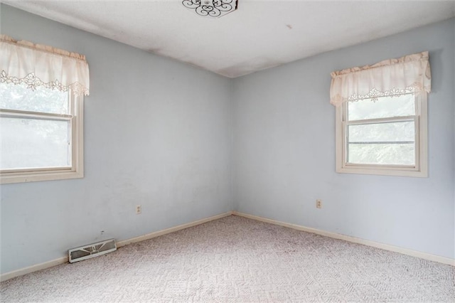 11301 Deer Haven Ln, Excelsior Springs, MO 64024 - carpeted empty room with baseboards