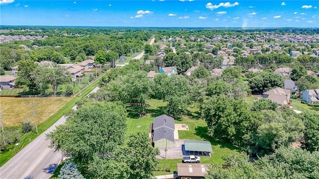 2633 E Langsford Rd, Lees Summit, MO 64063 - aerial view of property and surrounding area with nearby suburban area