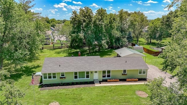 2633 E Langsford Rd, Lees Summit, MO 64063 - rear view of house featuring roof with shingles, a chimney, and view of scattered trees
