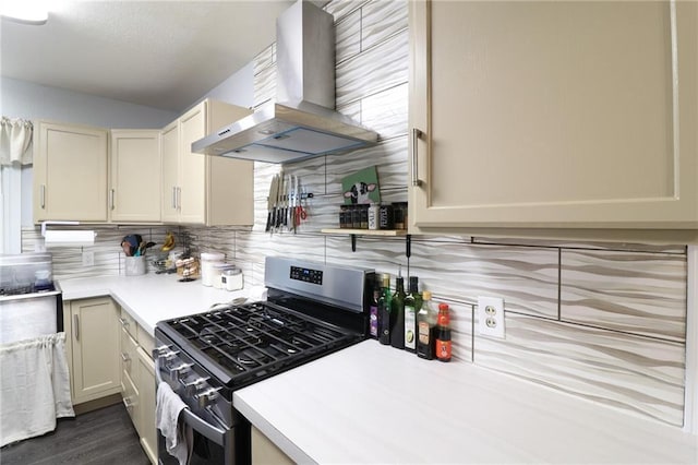 2633 E Langsford Rd, Lees Summit, MO 64063 - kitchen featuring stainless steel gas stove, exhaust hood, backsplash, light countertops, and lofted ceiling