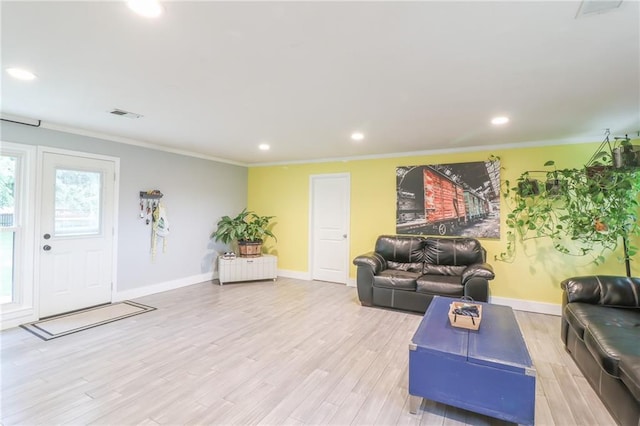 2633 E Langsford Rd, Lees Summit, MO 64063 - living room with recessed lighting, light wood finished floors, and ornamental molding