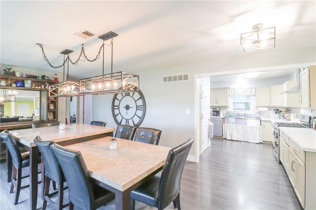 2633 E Langsford Rd, Lees Summit, MO 64063 - dining room with dark wood-style floors