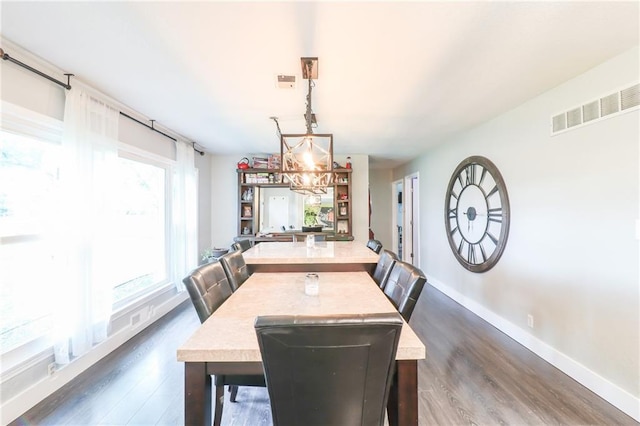 2633 E Langsford Rd, Lees Summit, MO 64063 - dining area featuring dark wood finished floors
