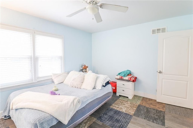 2633 E Langsford Rd, Lees Summit, MO 64063 - bedroom with ceiling fan and baseboards