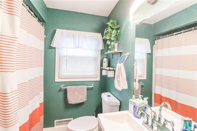 2633 E Langsford Rd, Lees Summit, MO 64063 - bathroom with vanity and a shower with shower curtain