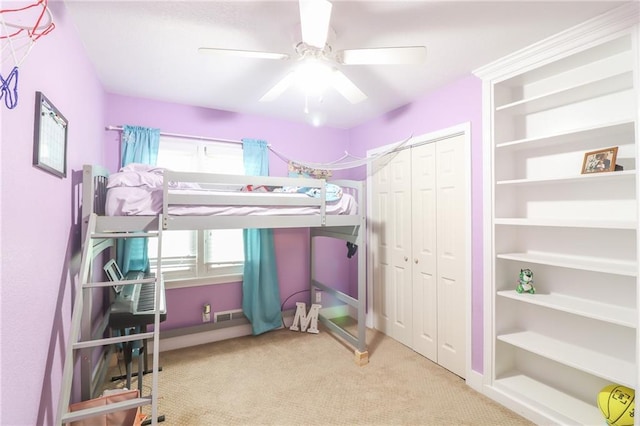 2633 E Langsford Rd, Lees Summit, MO 64063 - carpeted bedroom featuring a ceiling fan and a closet