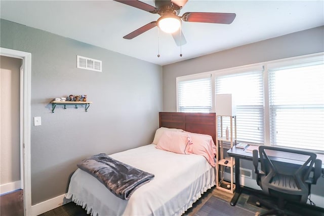 2633 E Langsford Rd, Lees Summit, MO 64063 - bedroom with baseboards and ceiling fan