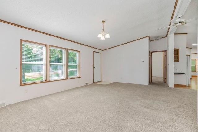 81 Enchanted Ln, Linn Valley, KS 66040 - spare room with light colored carpet, a chandelier, ornamental molding, ceiling fan, and lofted ceiling