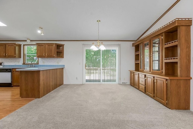 81 Enchanted Ln, Linn Valley, KS 66040 - kitchen featuring open shelves, dishwasher, ornamental molding, brown cabinetry, and lofted ceiling