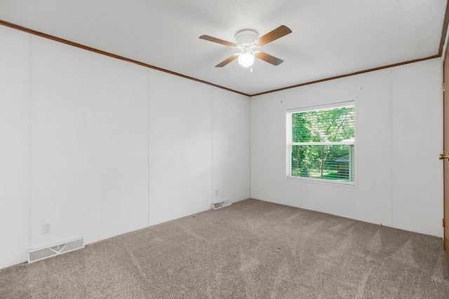 81 Enchanted Ln, Linn Valley, KS 66040 - carpeted empty room with a ceiling fan, ornamental molding, and a textured ceiling