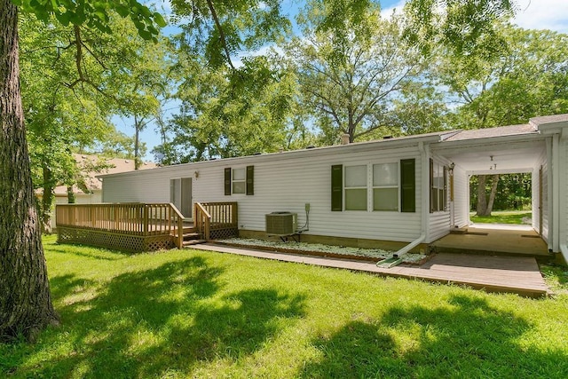 81 Enchanted Ln, Linn Valley, KS 66040 - rear view of property featuring a yard and a deck