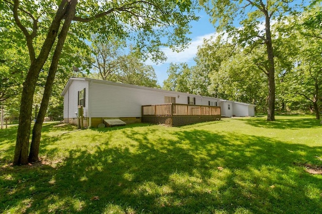 81 Enchanted Ln, Linn Valley, KS 66040 - view of grassy yard featuring a deck