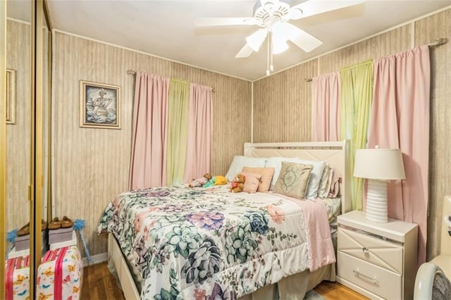 4234 E 68th St, Kansas City, MO 64132 - bedroom featuring wood finished floors and a ceiling fan