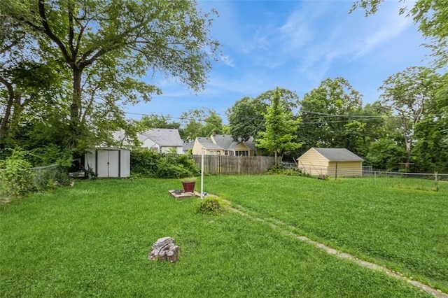 4234 E 68th St, Kansas City, MO 64132 - fenced backyard with a storage unit