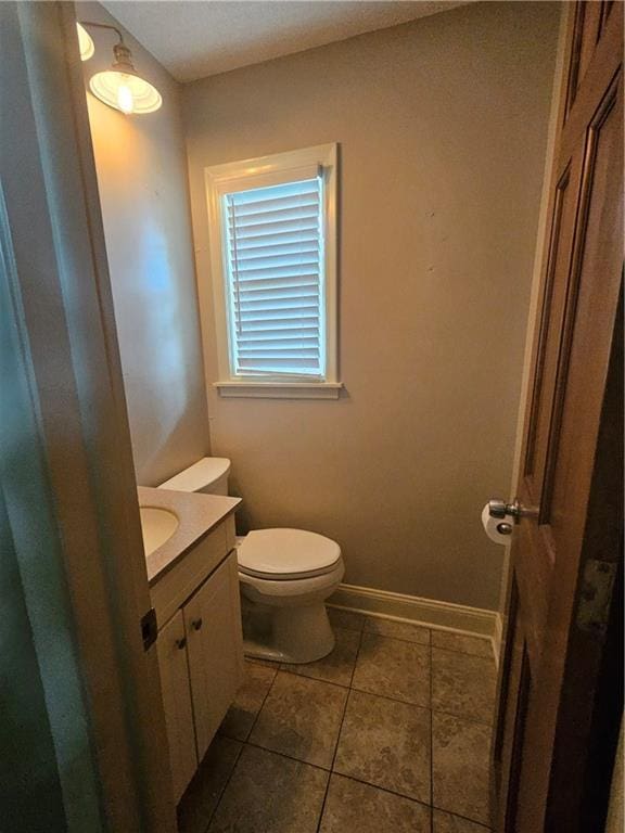 3 N 12th St, Louisburg, KS 66053 - half bath featuring vanity and tile patterned floors