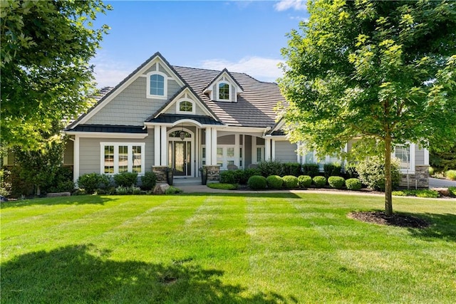 4915 NW Canyon Ct, Lees Summit, MO 64064 - view of front of house featuring a front lawn and stone siding