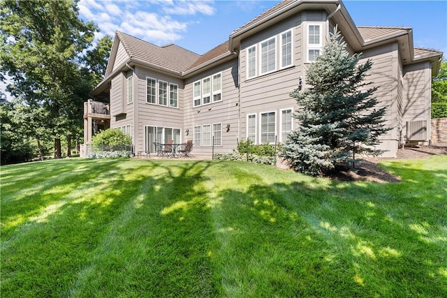 4915 NW Canyon Ct, Lees Summit, MO 64064 - back of property with a lawn