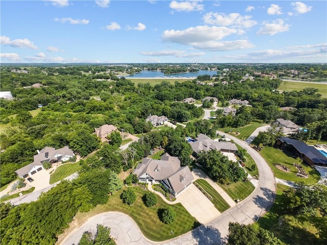 4915 NW Canyon Ct, Lees Summit, MO 64064 - aerial view of residential area featuring a large body of water