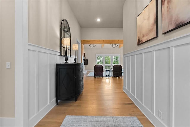 4915 NW Canyon Ct, Lees Summit, MO 64064 - corridor with a decorative wall, light wood-style floors, wainscoting, and recessed lighting