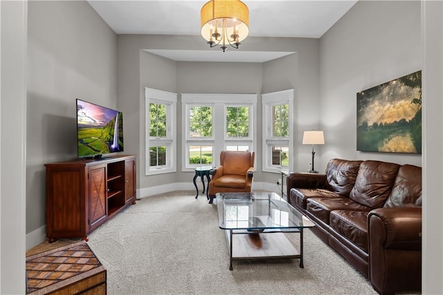 4915 NW Canyon Ct, Lees Summit, MO 64064 - living room featuring light carpet and a chandelier