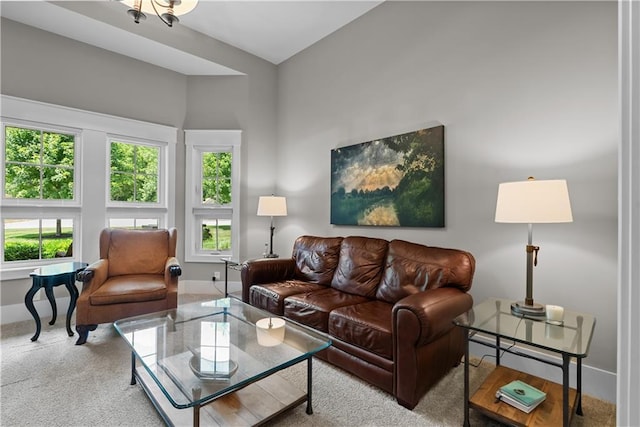 4915 NW Canyon Ct, Lees Summit, MO 64064 - living area with baseboards and carpet flooring