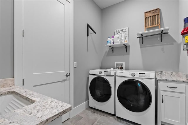4915 NW Canyon Ct, Lees Summit, MO 64064 - washroom with separate washer and dryer and cabinet space