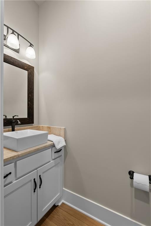 4915 NW Canyon Ct, Lees Summit, MO 64064 - bathroom with wood finished floors and vanity