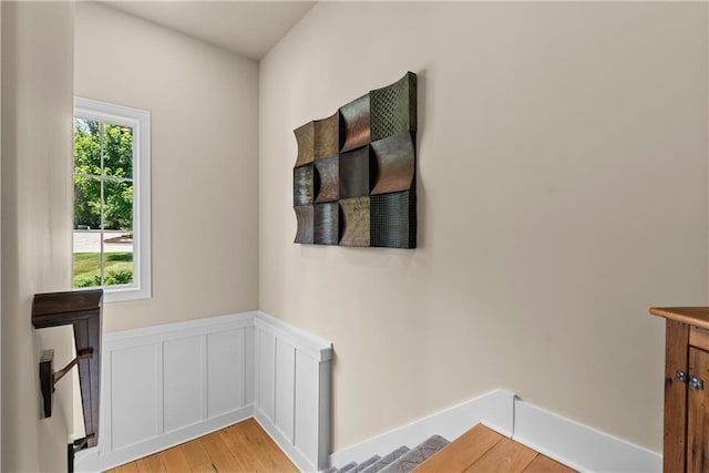 4915 NW Canyon Ct, Lees Summit, MO 64064 - staircase featuring wood finished floors