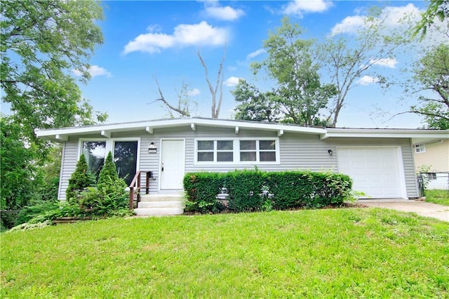 12507 E 46th Ter S, Independence, MO 64055 - view of front facade with a garage, a front yard, and concrete driveway
