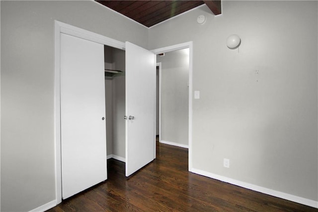 12507 E 46th Ter S, Independence, MO 64055 - unfurnished bedroom featuring wood finished floors, a closet, and wood ceiling
