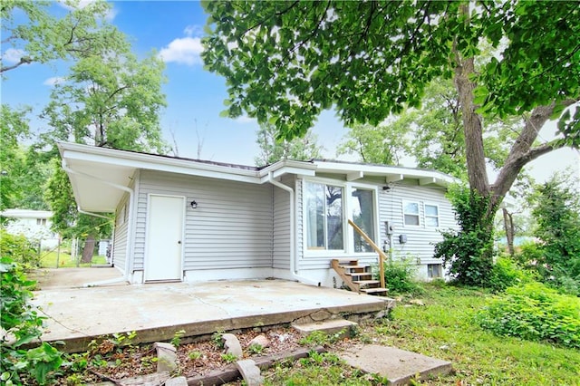 12507 E 46th Ter S, Independence, MO 64055 - back of house with a patio