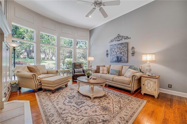 1617 Summit Valley Ln, Lees Summit, MO 64081 - living area featuring a ceiling fan, healthy amount of natural light, wood finished floors, and ornamental molding