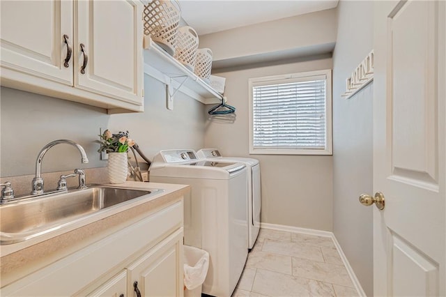 1617 Summit Valley Ln, Lees Summit, MO 64081 - laundry area featuring washer and dryer, cabinet space, and light marble finish flooring