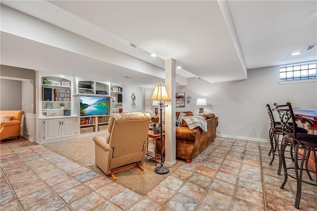 1617 Summit Valley Ln, Lees Summit, MO 64081 - living room featuring light stone finish flooring and recessed lighting