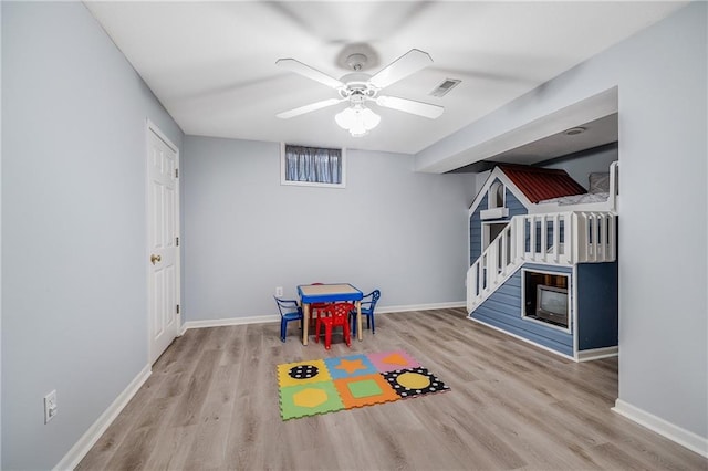 1617 Summit Valley Ln, Lees Summit, MO 64081 - rec room with wood finished floors and ceiling fan