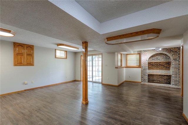 1733 NE Ridgeview Dr, Lees Summit, MO 64086 - unfurnished living room with wood finished floors and a textured ceiling