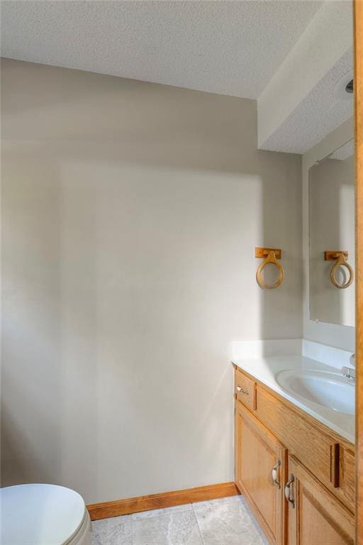 1733 NE Ridgeview Dr, Lees Summit, MO 64086 - half bath with vanity and a textured ceiling