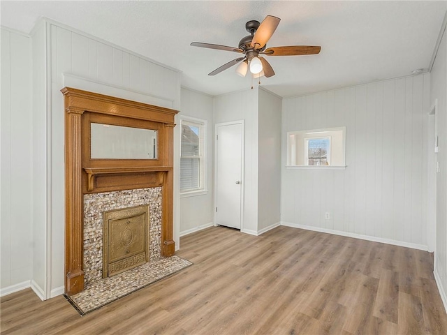 330 Wabash Ave, Kansas City, MO 64124 - unfurnished living room with wood finished floors and a ceiling fan