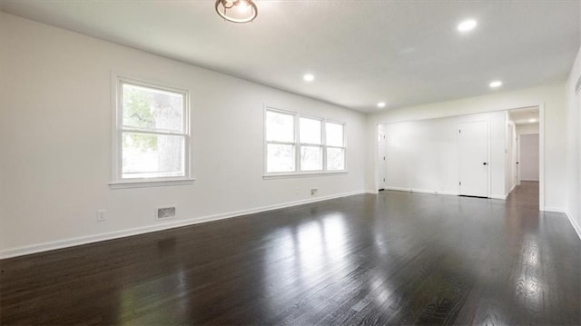 11400 E 62nd Ter, Raytown, MO 64133 - spare room with dark wood-type flooring and recessed lighting