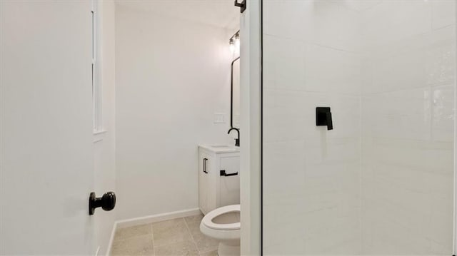 11400 E 62nd Ter, Raytown, MO 64133 - bathroom featuring vanity, a tile shower, and tile patterned floors
