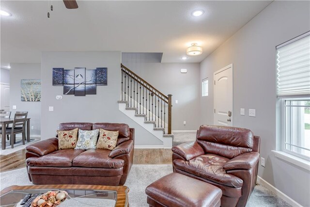 8604 NE 103rd St, Kansas City, MO 64157 - living area with stairway, wood finished floors, recessed lighting, and ceiling fan
