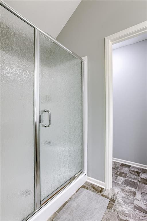 8604 NE 103rd St, Kansas City, MO 64157 - full bath with a shower stall and baseboards