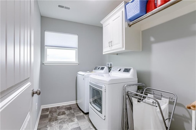 8604 NE 103rd St, Kansas City, MO 64157 - laundry room with washing machine and dryer and cabinet space