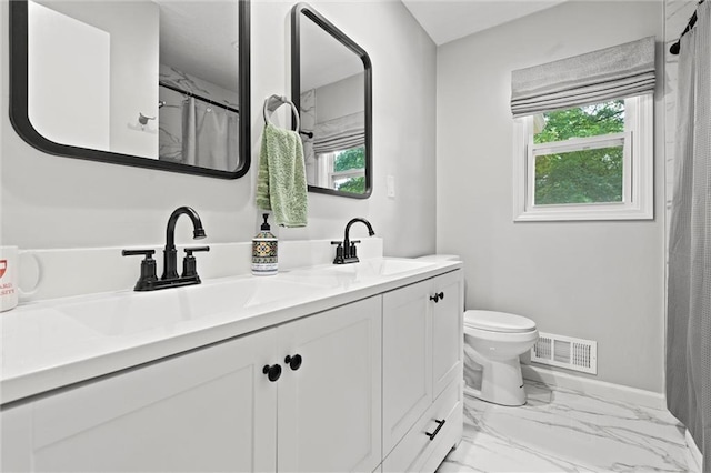 101 W 116th St, Kansas City, MO 64114 - full bath with double vanity, marble look tile flooring, and a shower with shower curtain