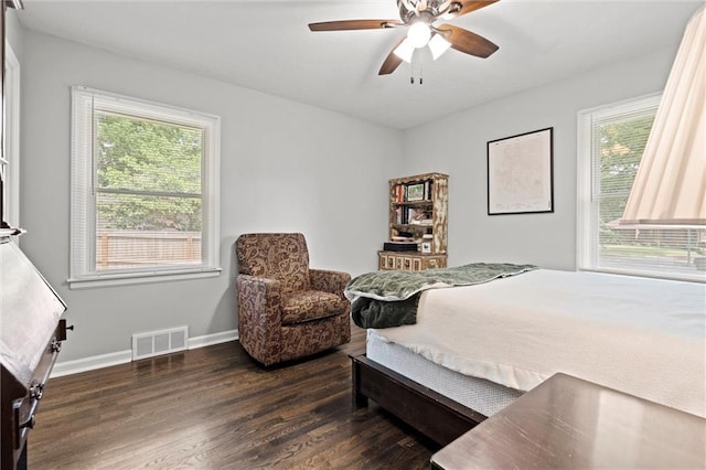 101 W 116th St, Kansas City, MO 64114 - bedroom with dark wood-style flooring and a ceiling fan