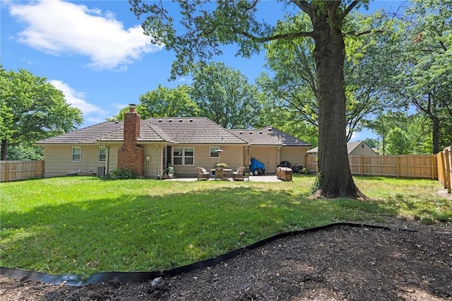 101 W 116th St, Kansas City, MO 64114 - back of house with a fenced backyard, a chimney, a tile roof, and a patio