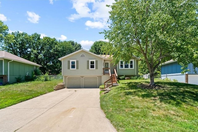 406 Crescent St, Lees Summit, MO 64063 - ranch-style house with driveway, a garage, a front lawn, and stairway
