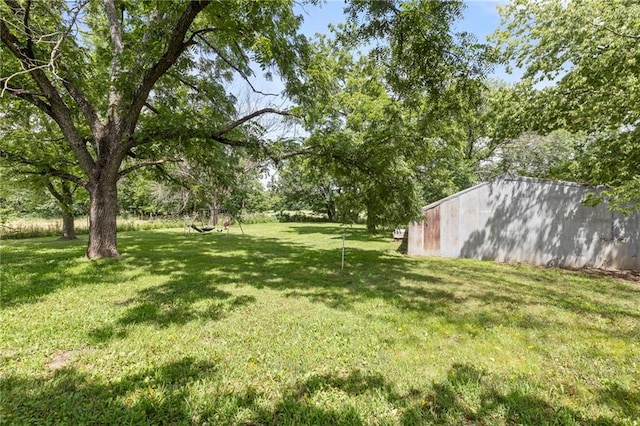 35365 Block Rd, Paola, KS 66071 - view of green lawn featuring an outbuilding
