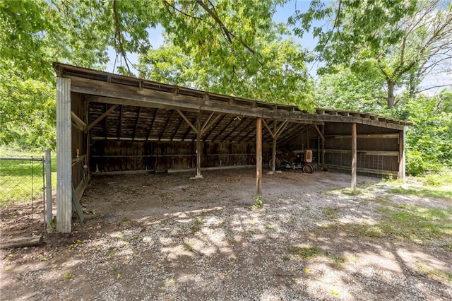 35365 Block Rd, Paola, KS 66071 - view of car parking featuring a detached carport and an outbuilding